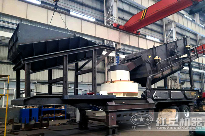 可移動(dòng)式磕沙機(jī)廠家車(chē)間圖